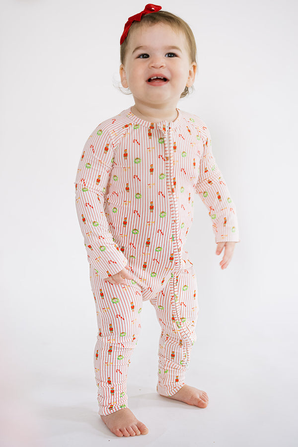Girl wearing Christmas pajamas