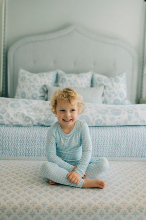 Nellie Howard Ossi X The Uptown Baby Watercolor Basket Weave Romper