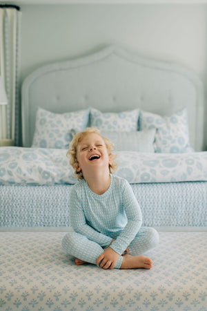 Nellie Howard Ossi X The Uptown Baby Watercolor Basket Weave Romper