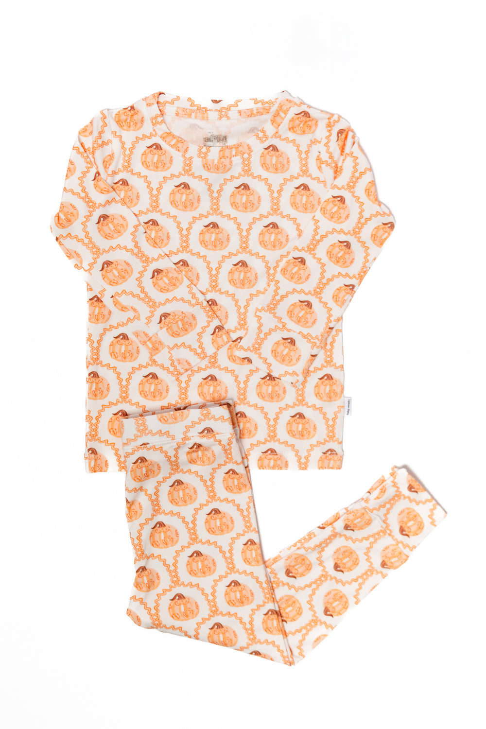 A two-piece pumpkin-shaped pajama set for toddlers, with orange and white colors and pumpkin patterns.