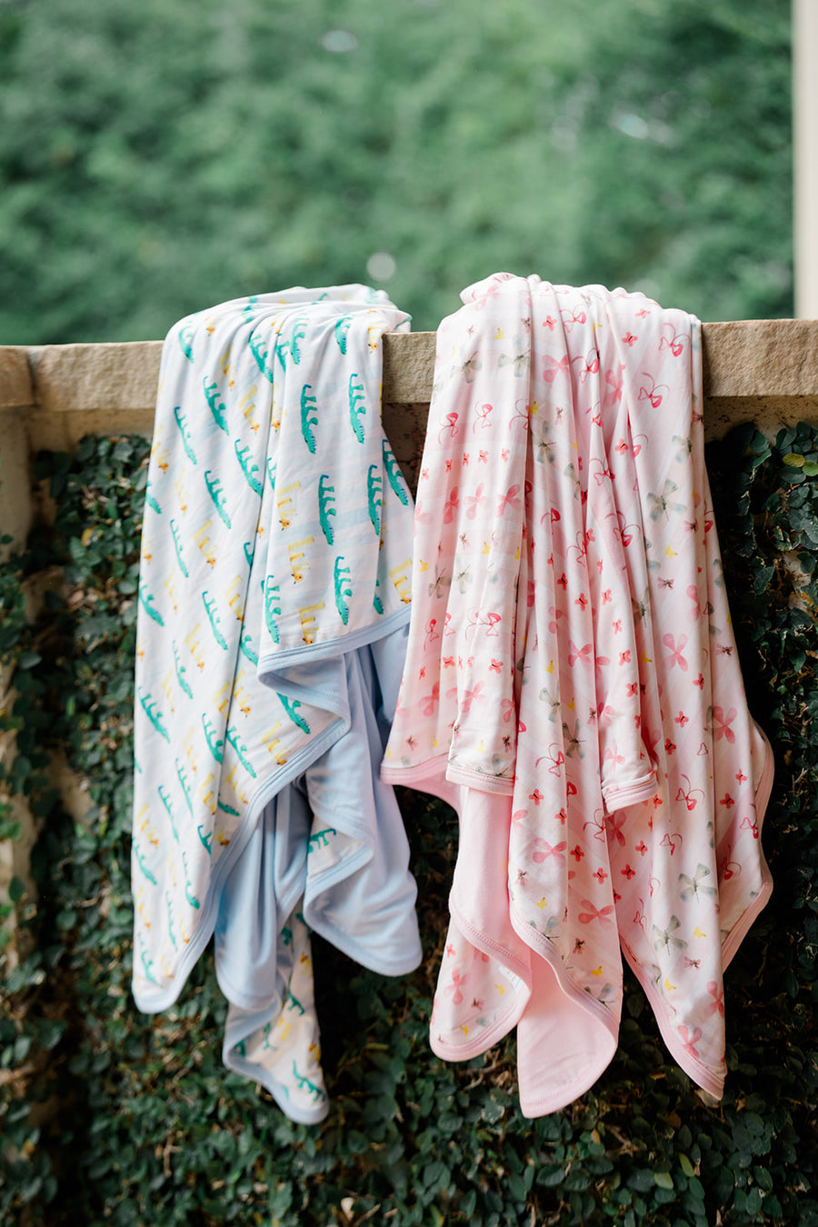 Soft blankets draped over a railing (The Uptown Baby)