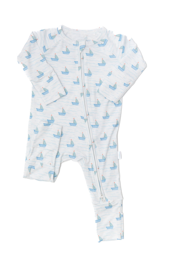Baby onesie with boat pattern on a white background