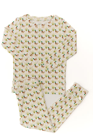 Long-sleeve shirt with duck pattern on a white background