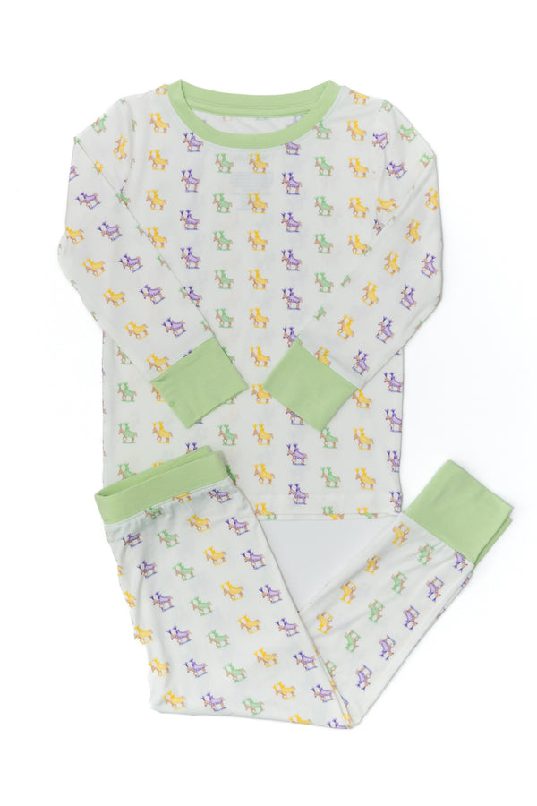 Children's pajama set with frog pattern on a white background
