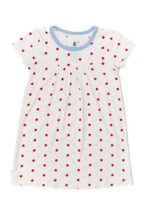 White dress with red star pattern on a white background