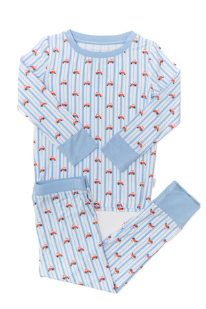 Children's pajama set with flamingo pattern on a white background