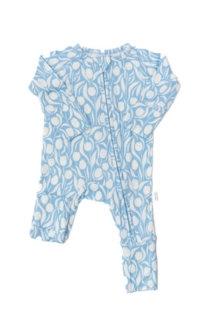 Baby romper with blue and white floral pattern on a white background
